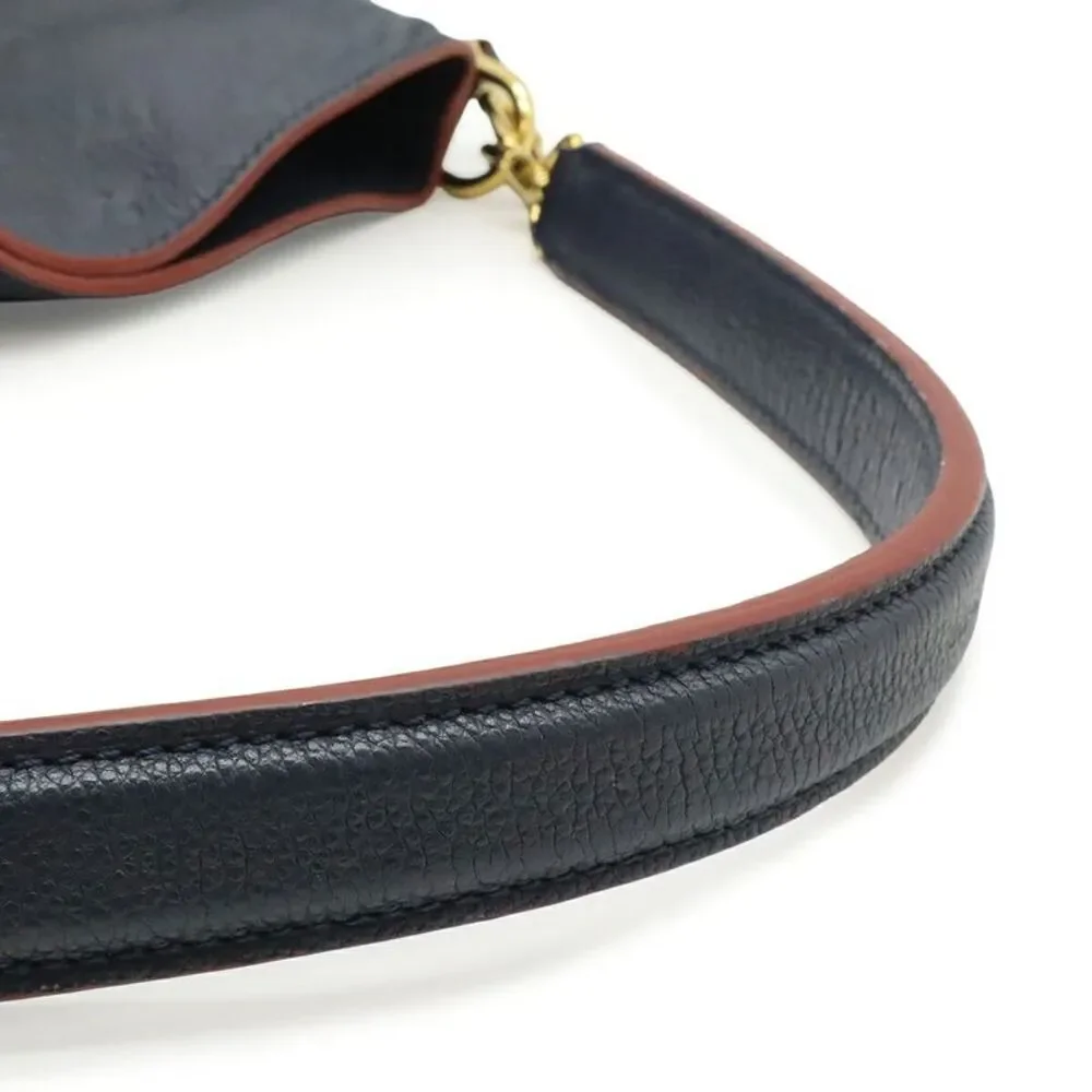 Louis Vuitton Monogram Empreinte Merry Bag